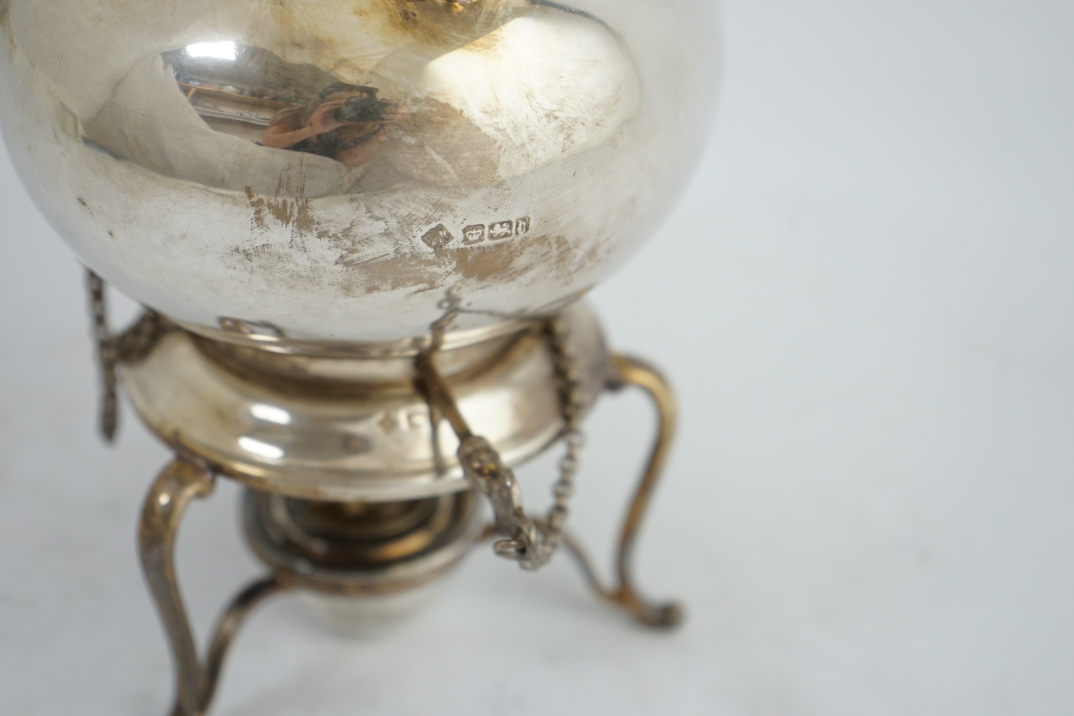 A late Victorian silver bachelor's tea kettle on stand with burner, by Martin, Hall & Co